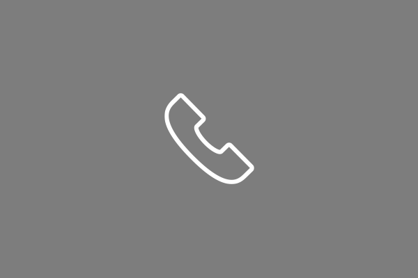 white outlined phone symbol on gray background