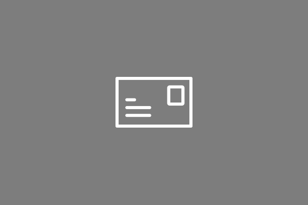 Simplified symbol of a postcard on gray background.