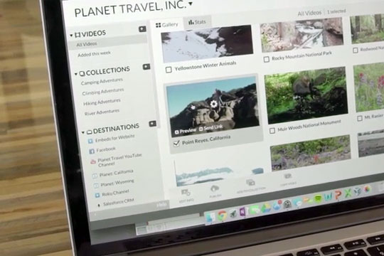 Closeup of laptop showing uStudio's video content management.