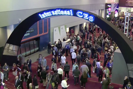 Overhead shot of people walking at the CES trade show.